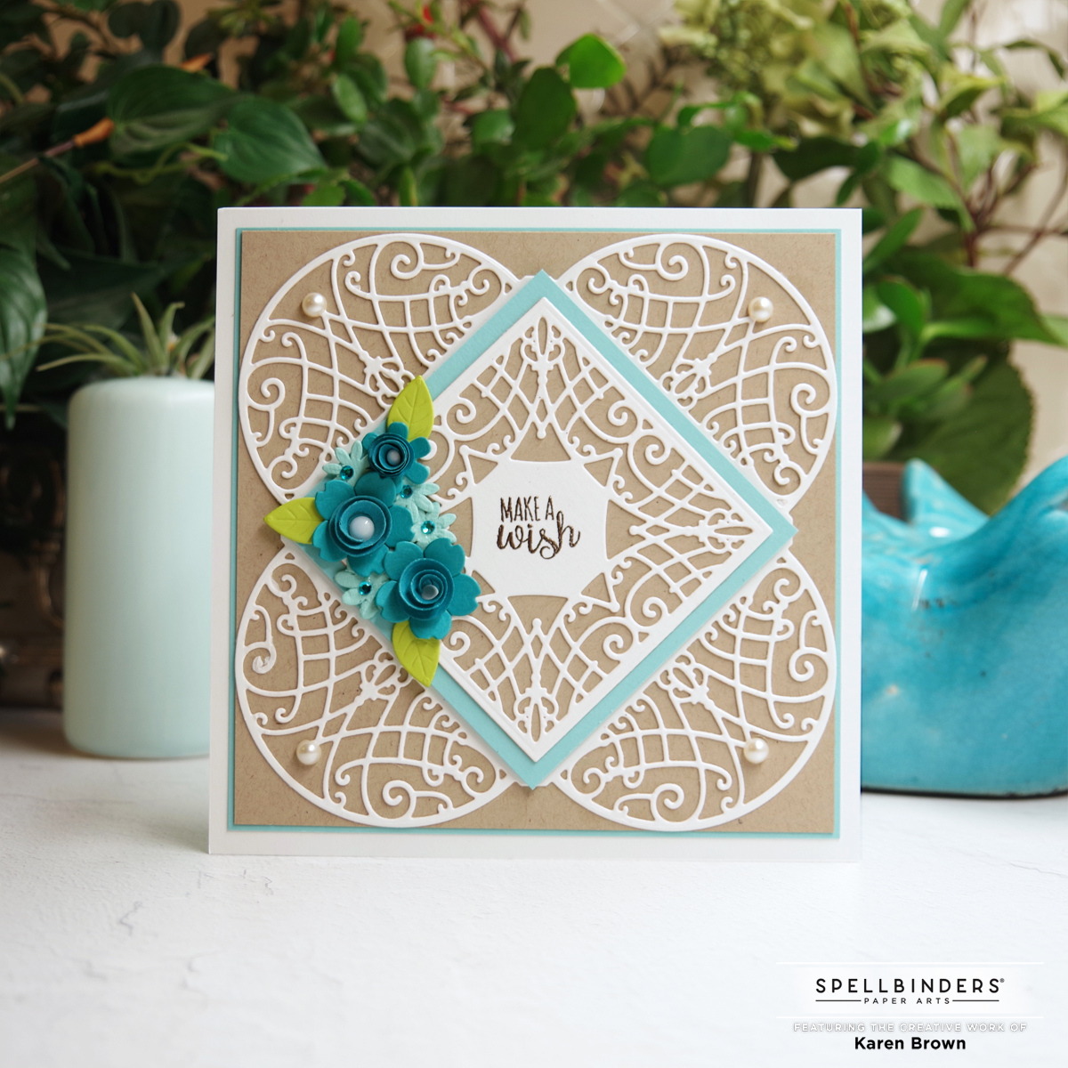 Spellbinder's August 2021 Amazing Paper Grace Die of the Month card in Kraft and Aqua.