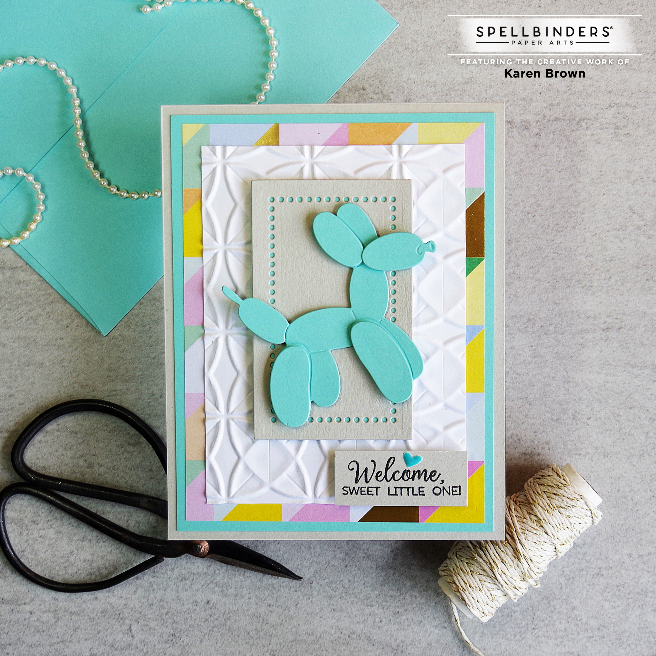 Baby Shower handmade card featuring Spellbinders:  Balloon Party Animal, Origami Folds 3D Embossing Folder, and Cheerful Occasions paper pad.