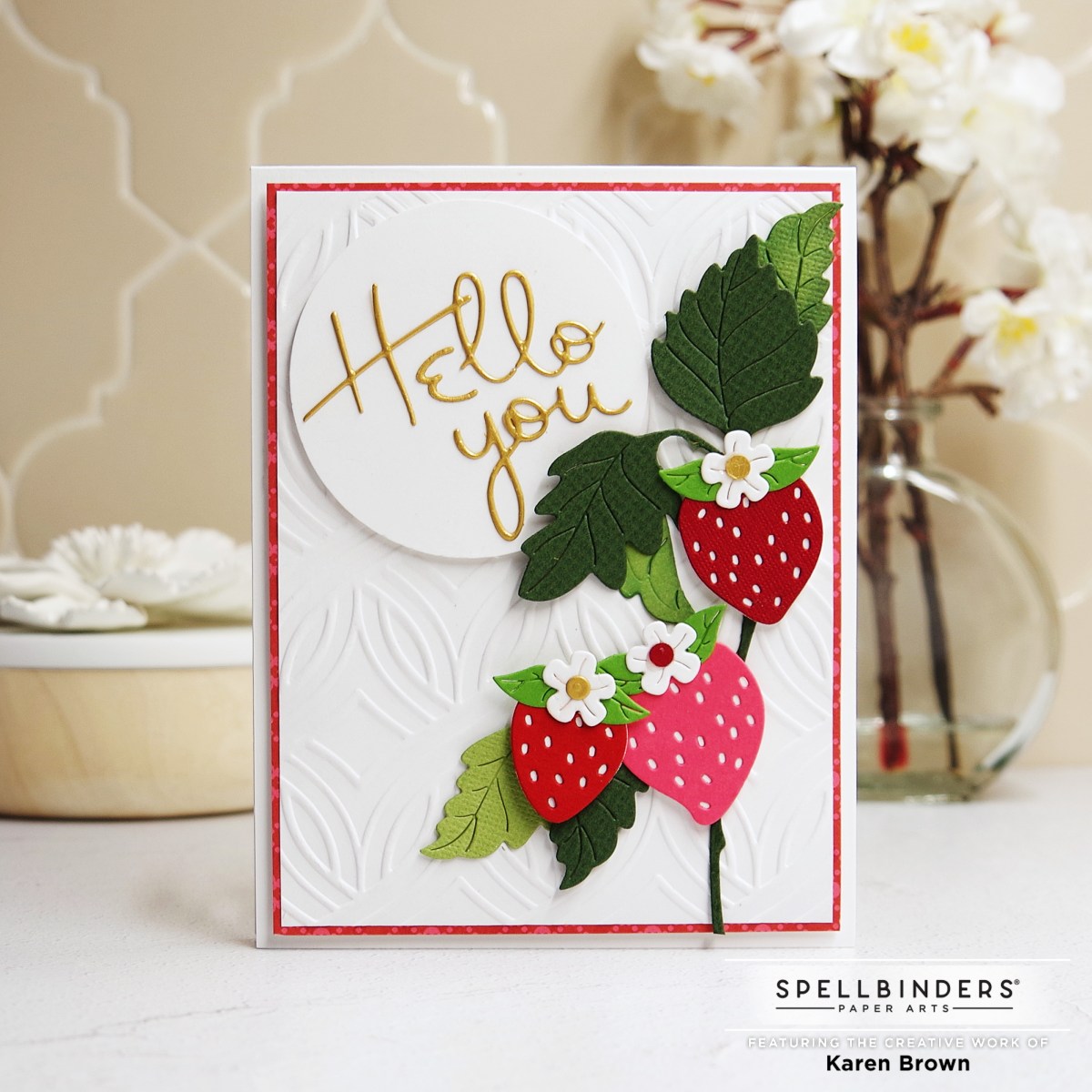 Cheerful handmade card with die cut strawberries.