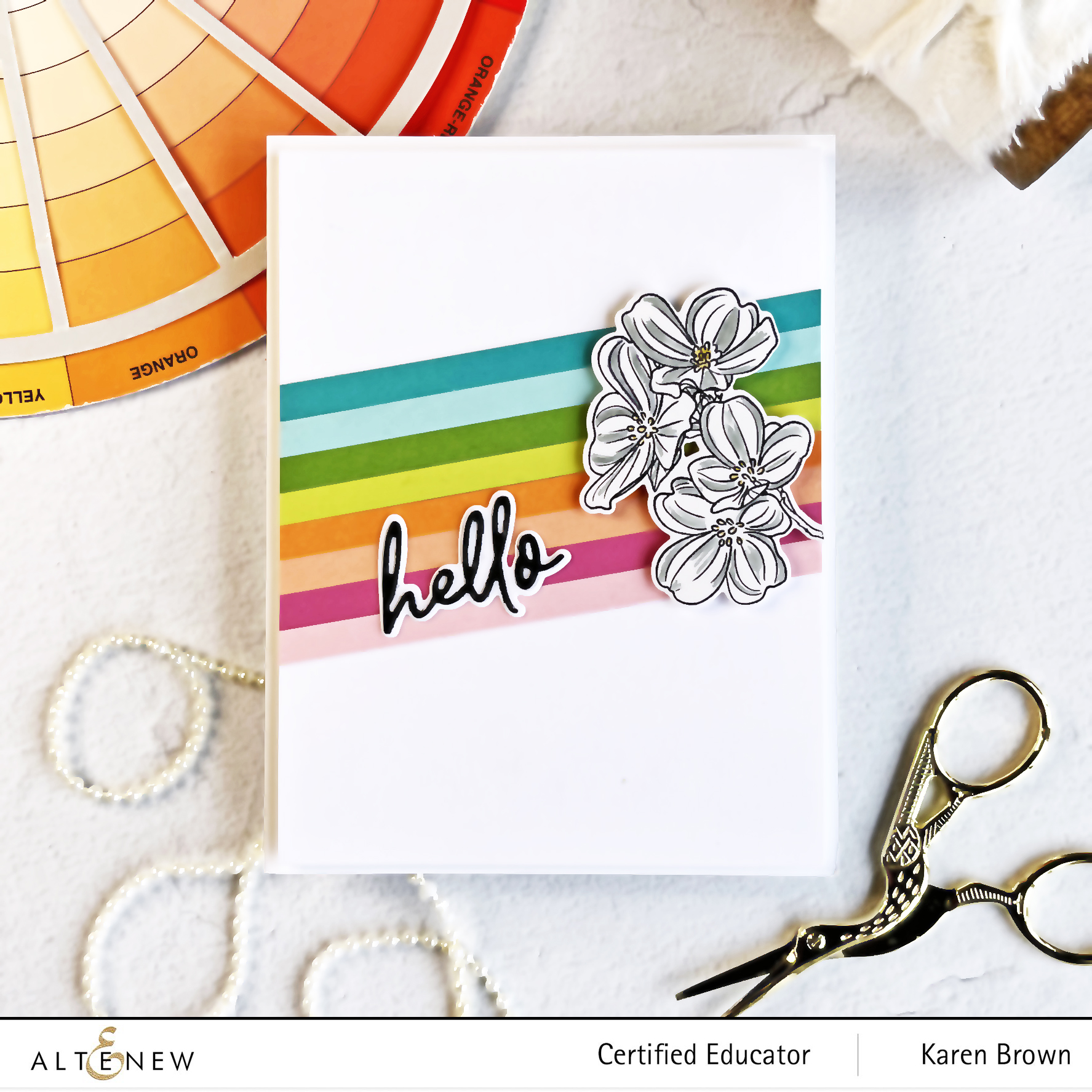 Using strips of colored cardstock to make colorful rainbow backgrounds.