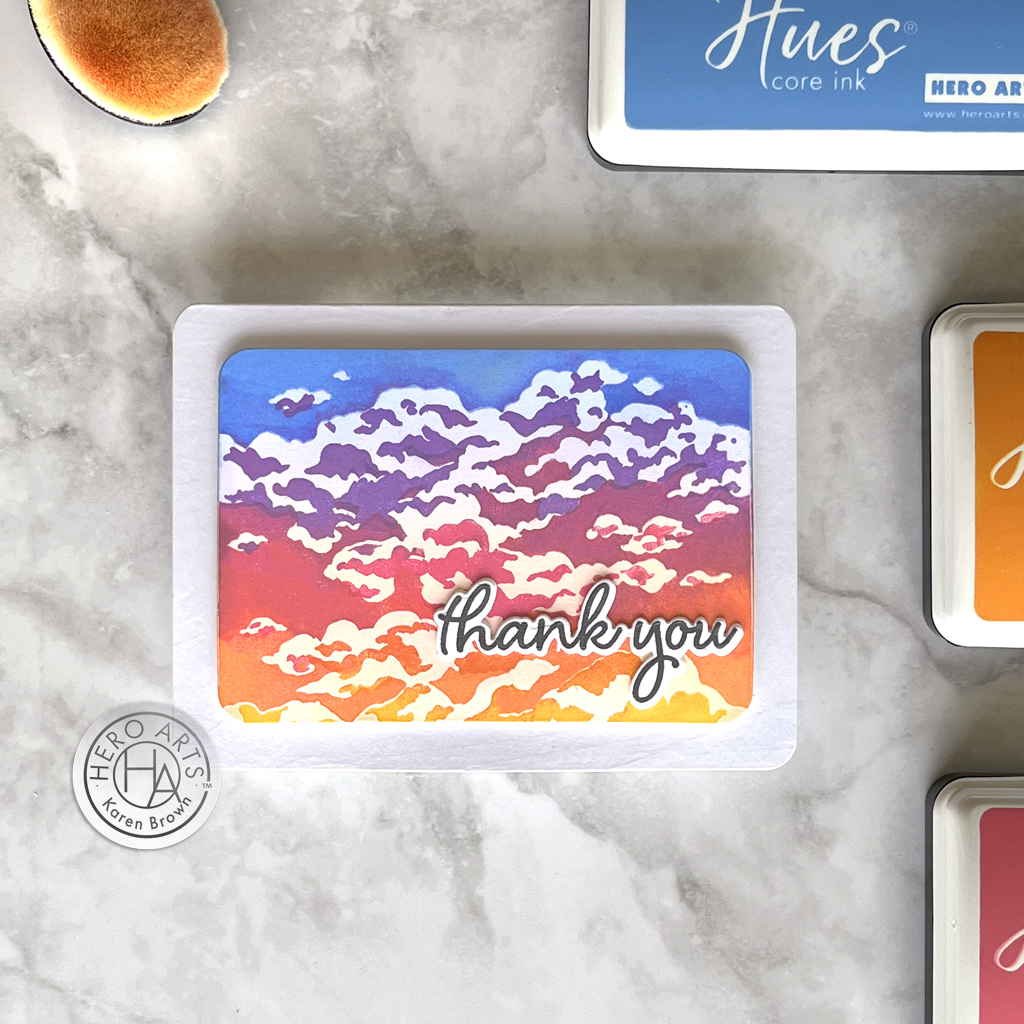 A colorful handmade thank you card simulating a vibrant sunrise.  The card was created with the June 2024 Hero Studio HeroScape card kit.