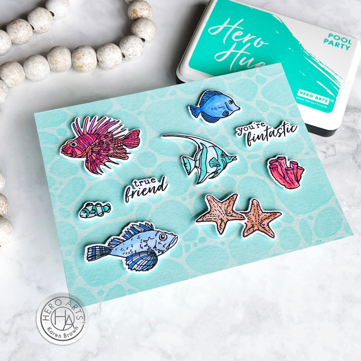 Colorful aquatic under-water theme Heroscape card created with Hero Arts Tropical Fishes stamps and die + Pebbles and Stones stencil.