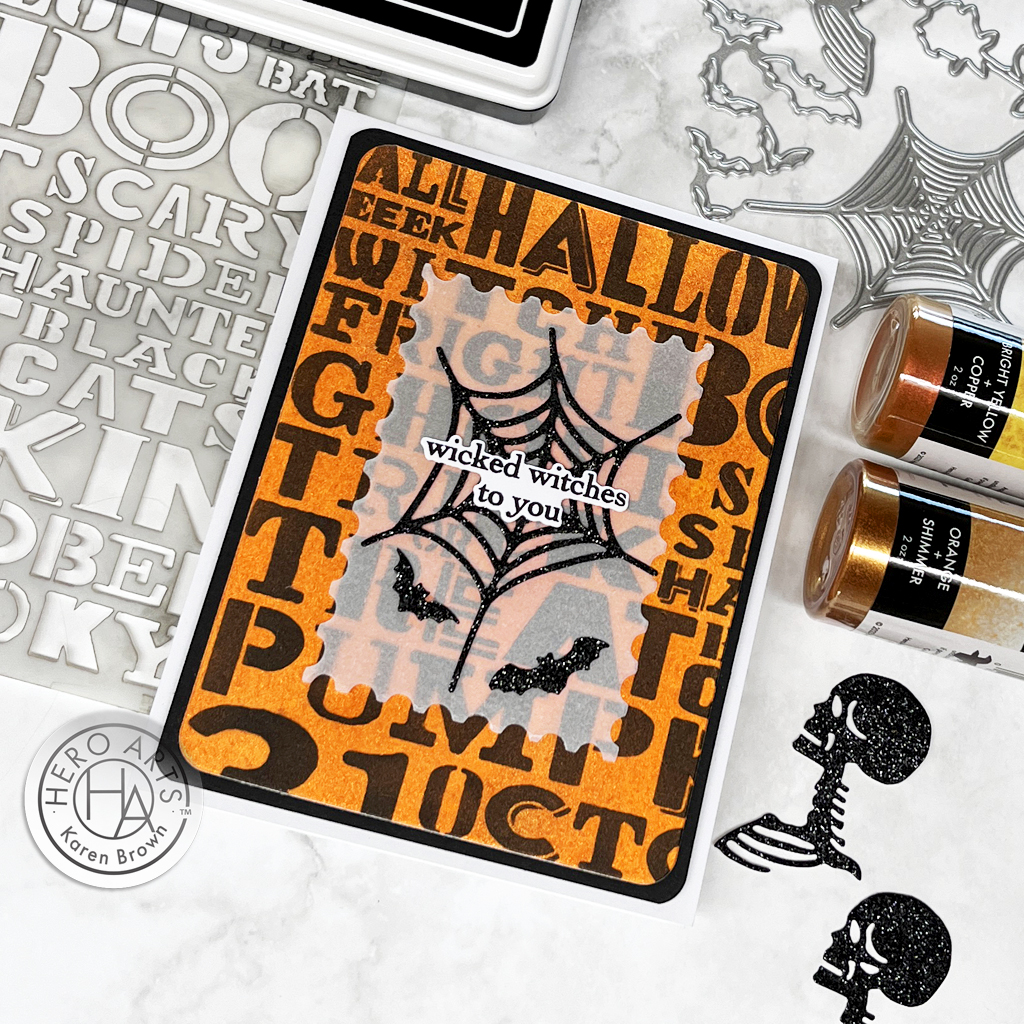 Fun orange Halloween card with die cut spider web and bats + stenciled shimmer spray background.  