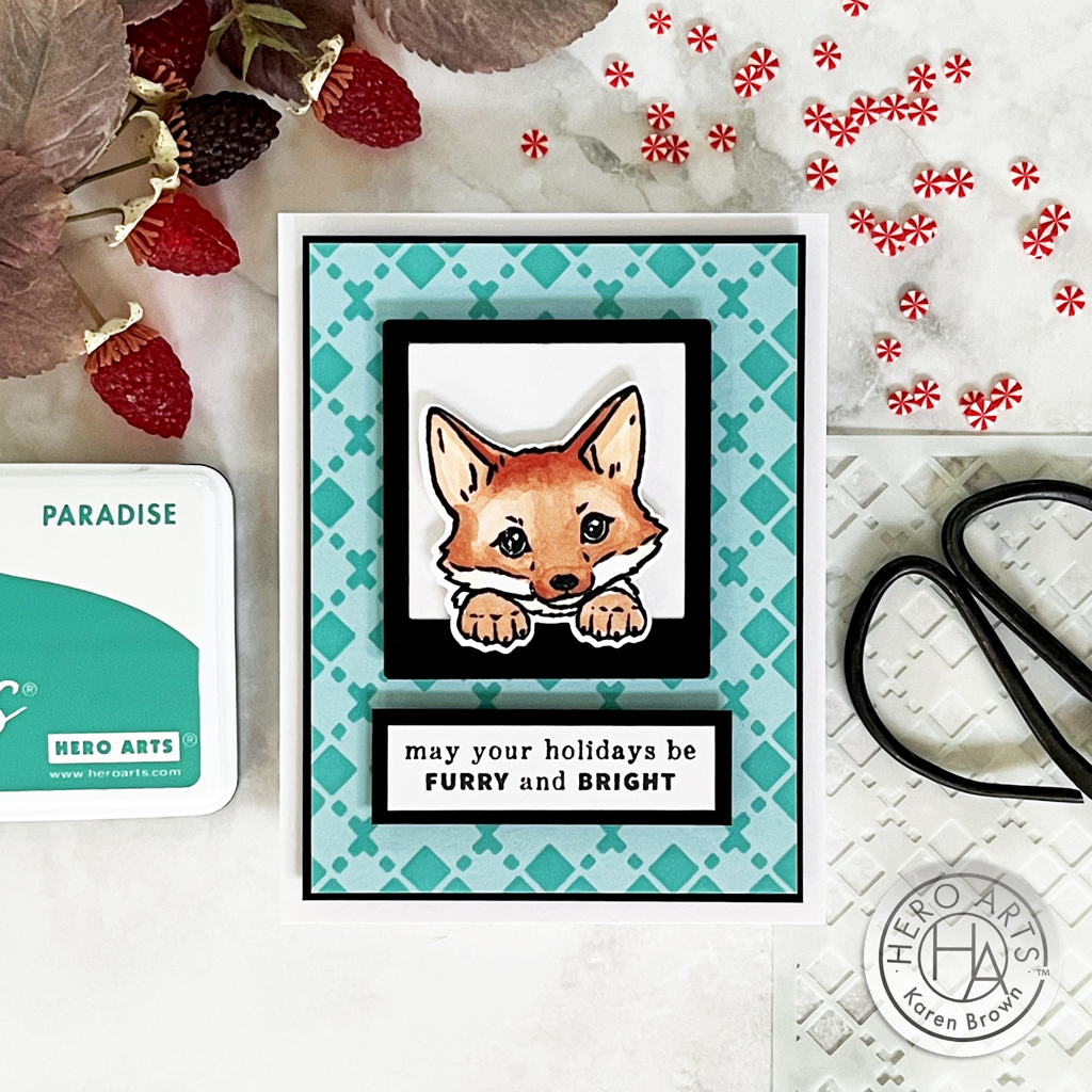 Handmade card with an adorable fox and an aqua and turquoise stenciled plaid background. Sentiment "furry and bright".
