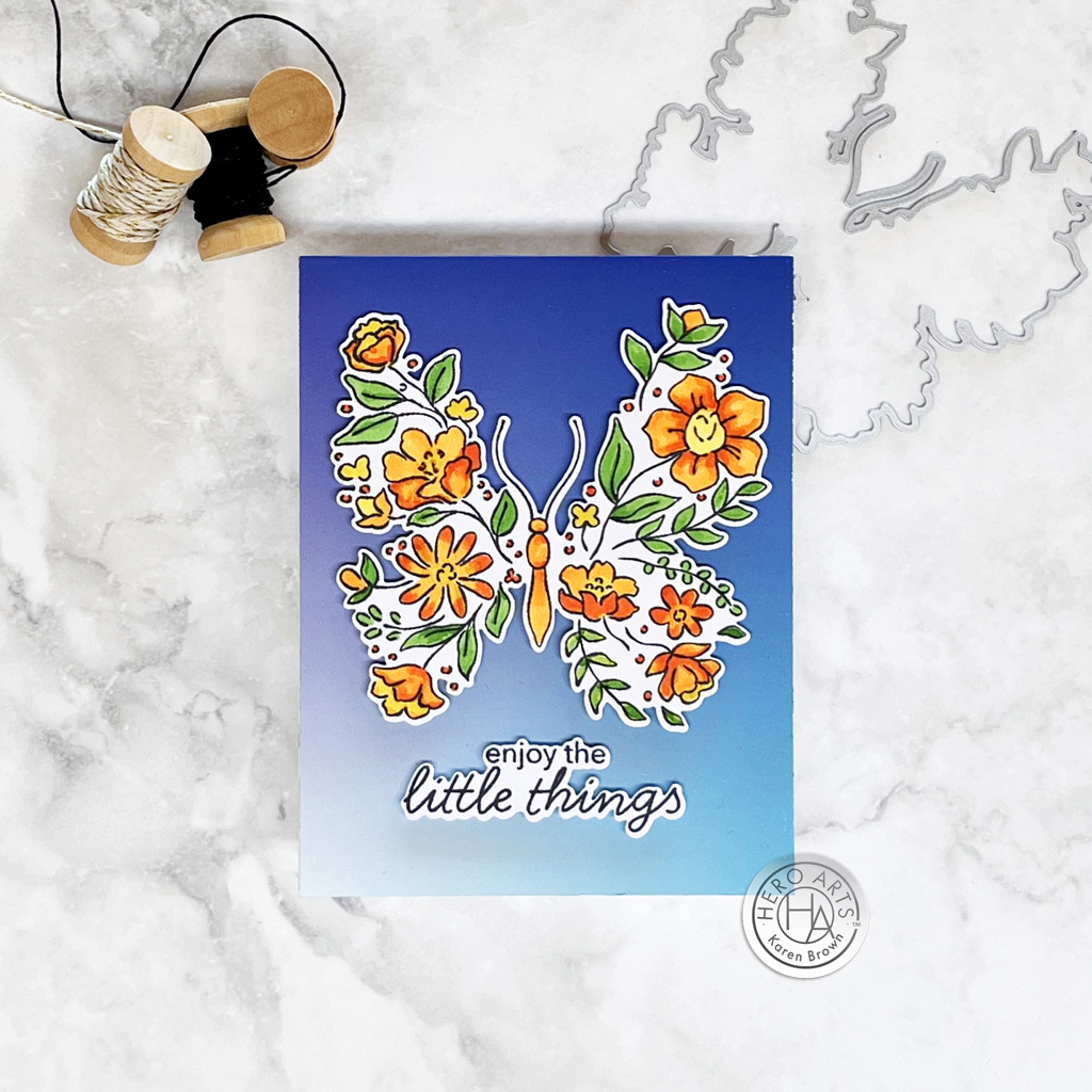 Stamped, colored and die cut Floral Butterfly card on an ombre background created with Hero Rub-On Transfers.