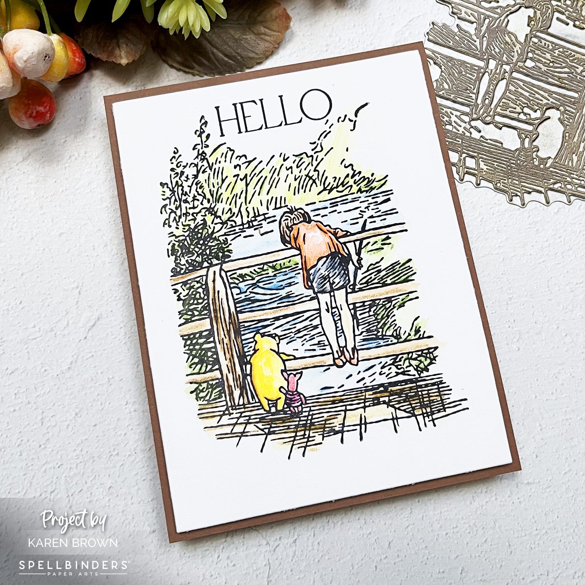 Hello card showing a colorful Winnie the Pooh and Christopher Robin scene, hand-painted with Inktense Watercolor Pencils over a black BetterPress impression.