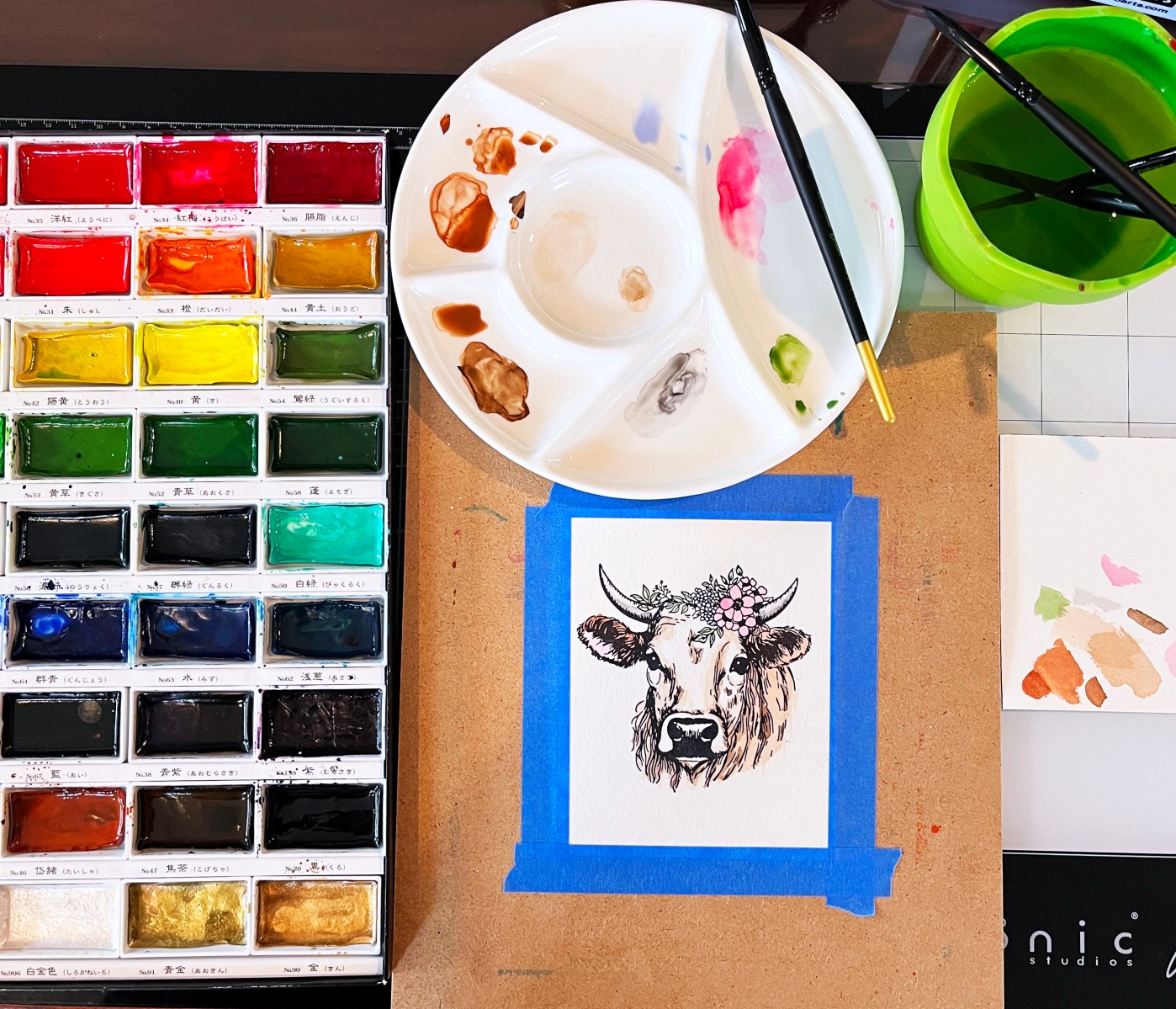 Process photo showing my watercoloring technique for colorizing my Spellbinders BetterPress Cow print.