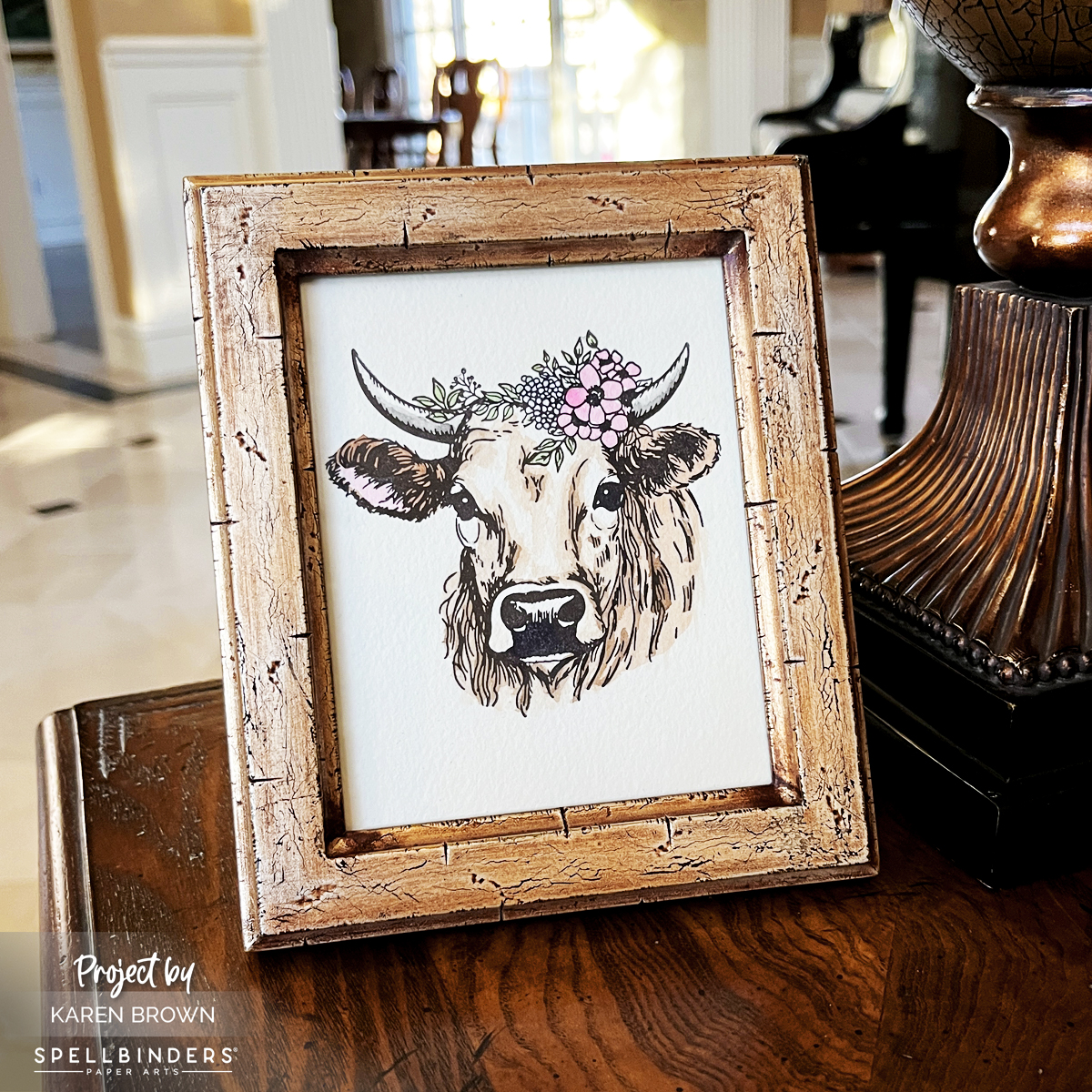 Spellbinders Clover the Cow watercolored BetterPress Animal Art piece framed to display in home.