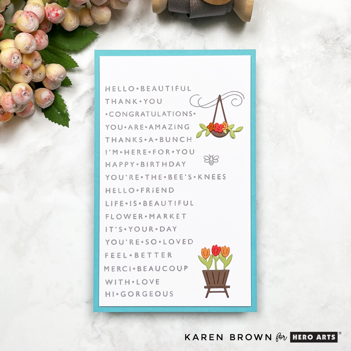 Easy gray sentiment strip background for a clean and classic card design with two die cut floral embellishments.