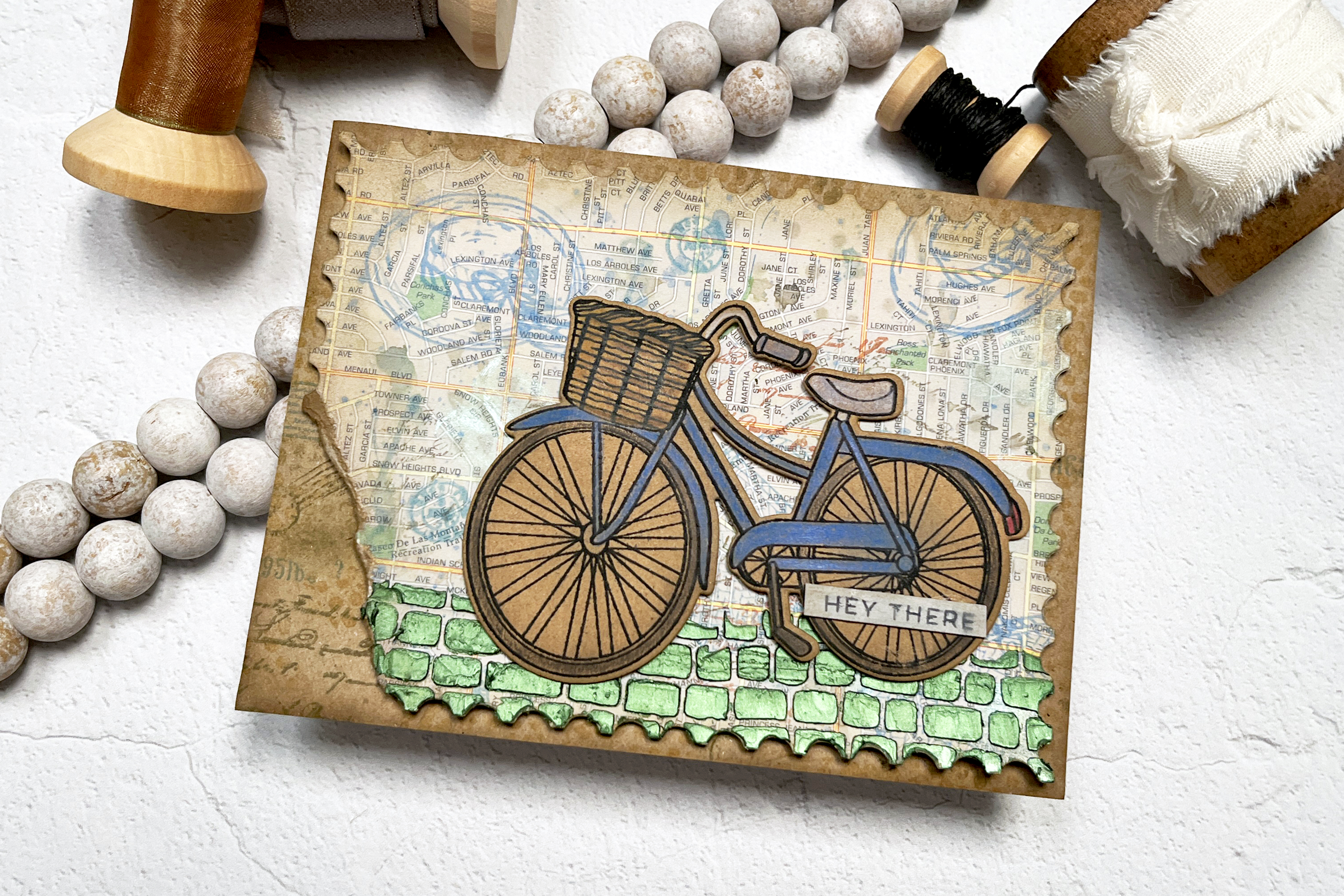 Handmade mixed media card using everyday supplies + a map.