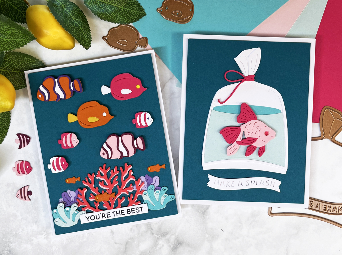 2 colorful aquatic theme die cut scene cards featuring bright bold colors, a graphic look  and LOTS of fish.