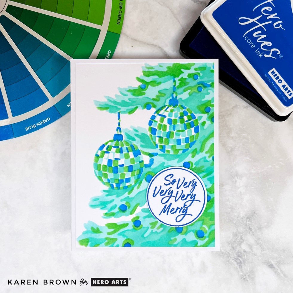 layering stencil handmade Christmas card fo a Christmas Tree with ornaments.