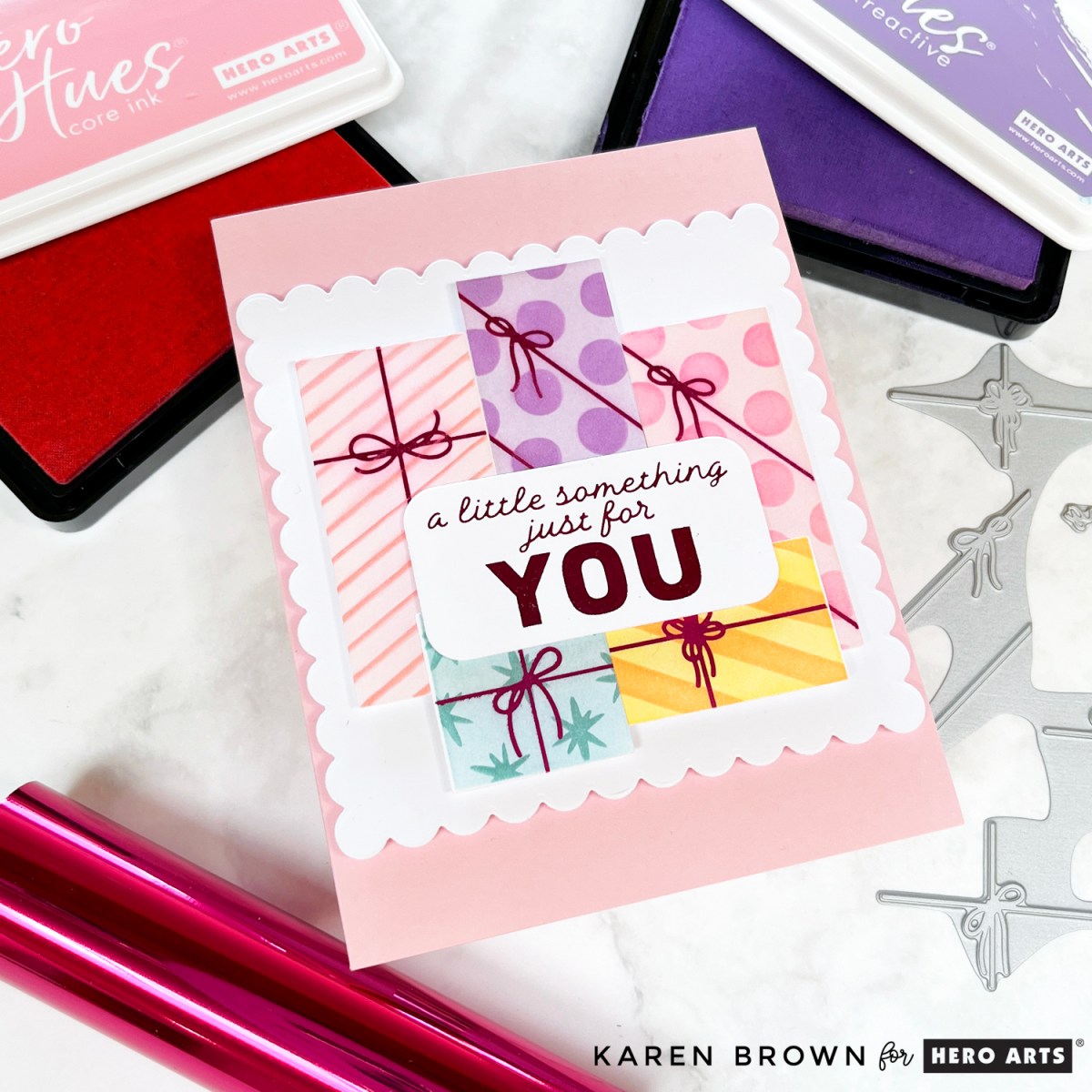 Handmade pastel rainbow card with hot foiled, stenciled and die cut gift packages with magenta foil perfect for a birthday or shower.