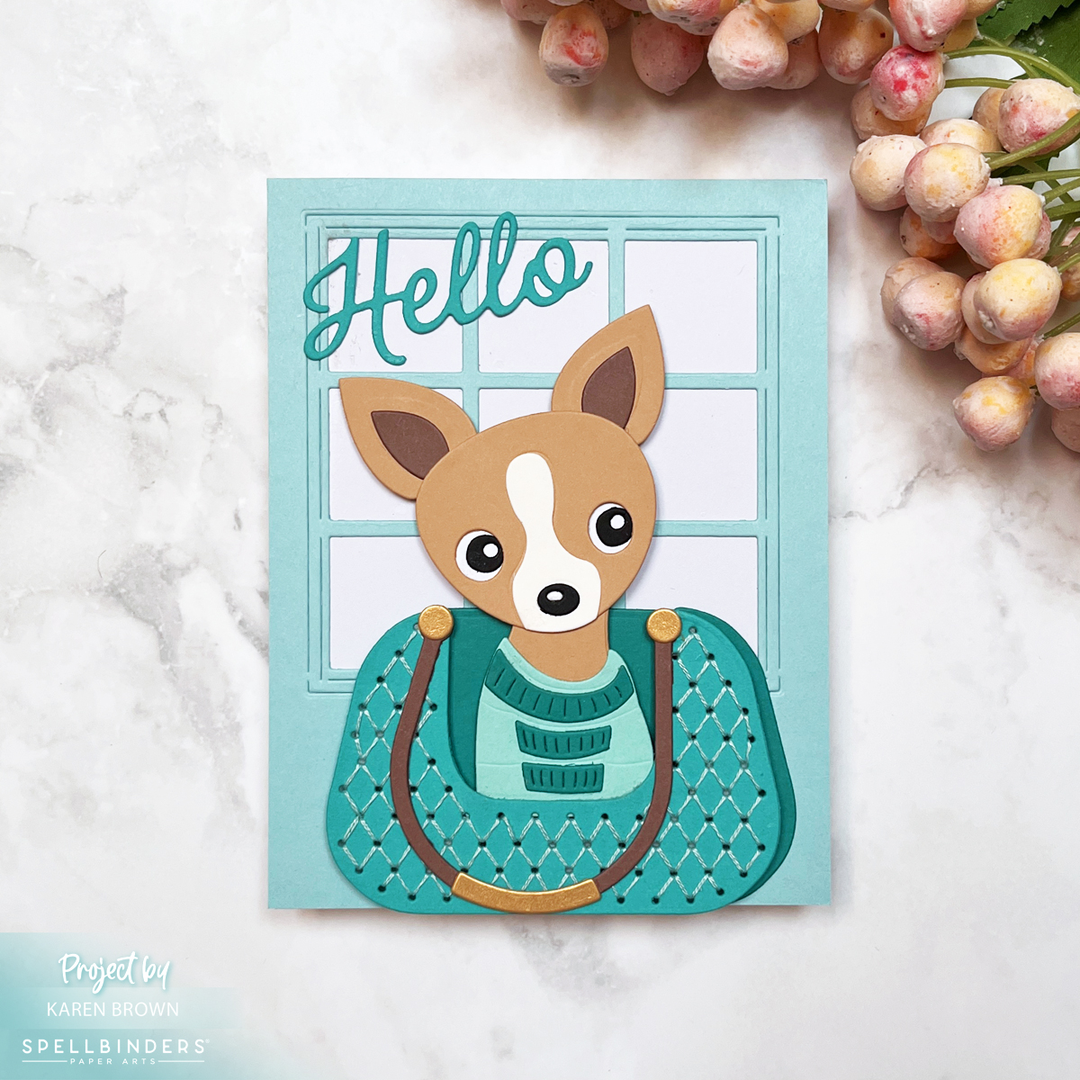 Adorable handmade card with a Chihuahua dog peeking out of a die cut handstitched purse with colors in 4 shades of aqua.