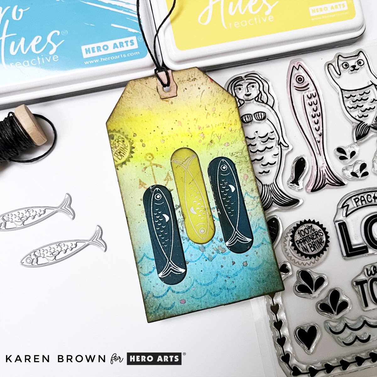 Aquatic theme mixed media tag using Hero Arts Partners in Brine Stamp set and Glad We Are Tight BetterPress letterpress fish plates.