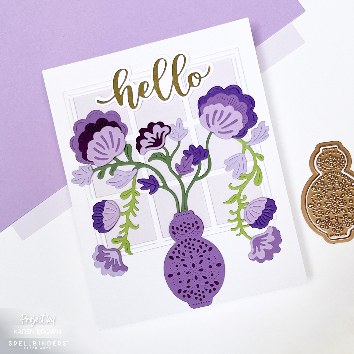 Handmade floral card featuring purple Regal Blooms flowers in a vase in front of a nine-pane window, with a glimmer hot foil “hello” sentiment and a soft lavender background