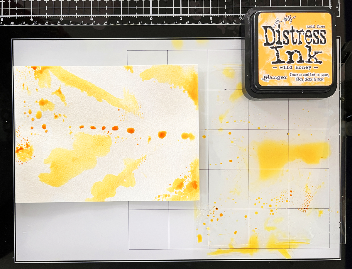 Process photo showing Ink Smoosh Acetate variation with yellow ink on watercolor paper.