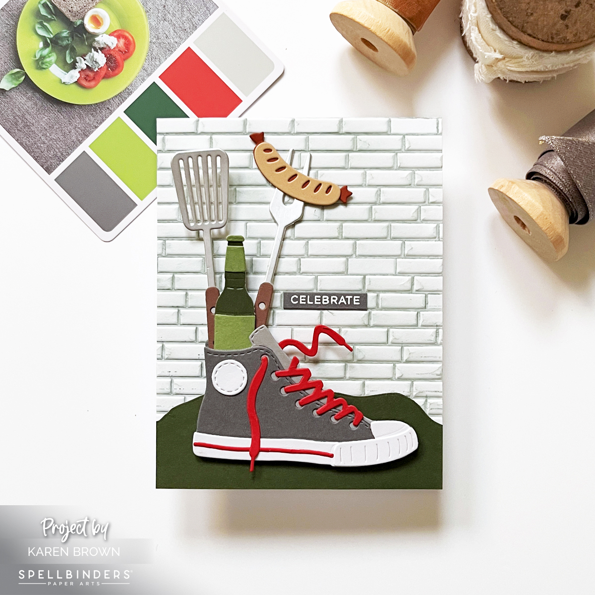 Masculine die cut scene card featuring a gray high top sneaker filled with grilling tools and a hot dog on an embossed brick background perfect for Father's Day or Birthdays.