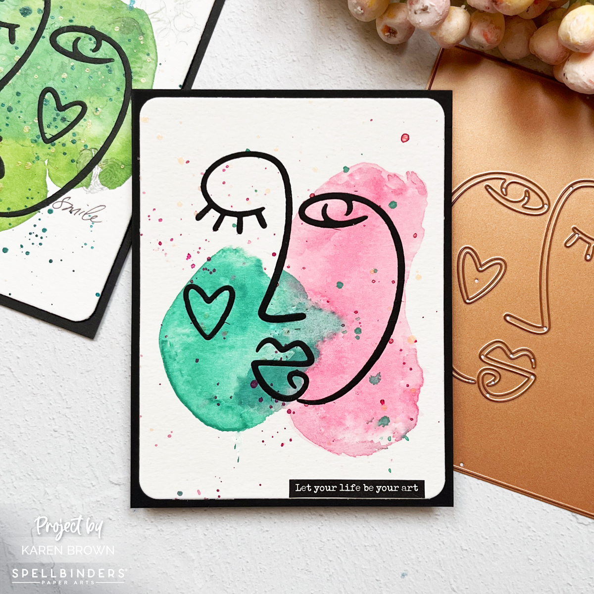 Pink and green modern watercolor card with minimalist black face die cut