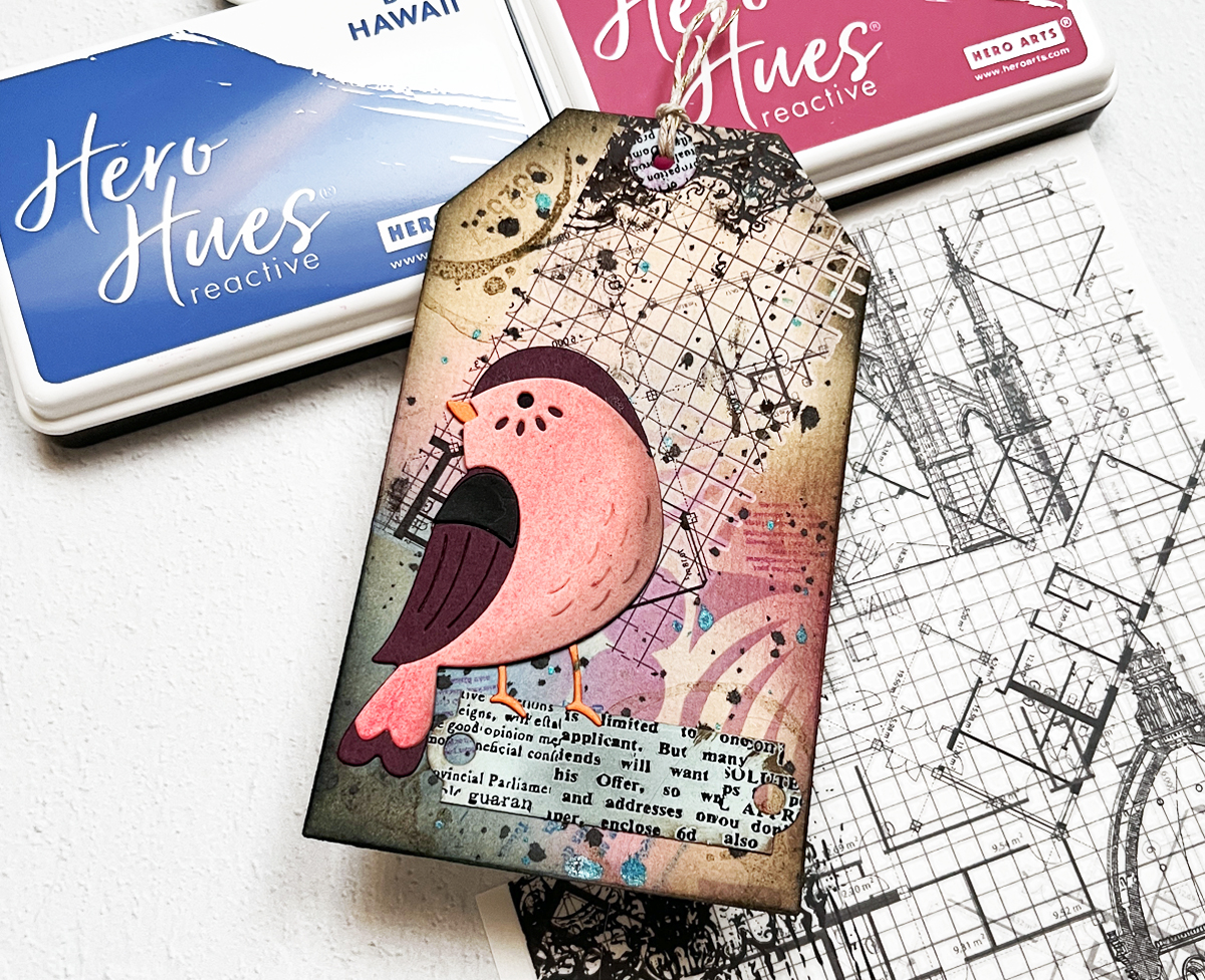 Stenciled, ink blended tag with rub on transfers with 7 layers.