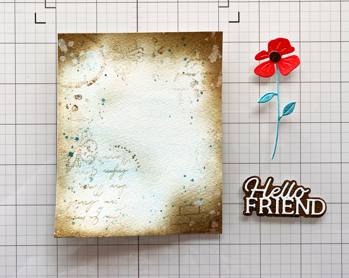 process photo:  distressing the edges on mixed media projects