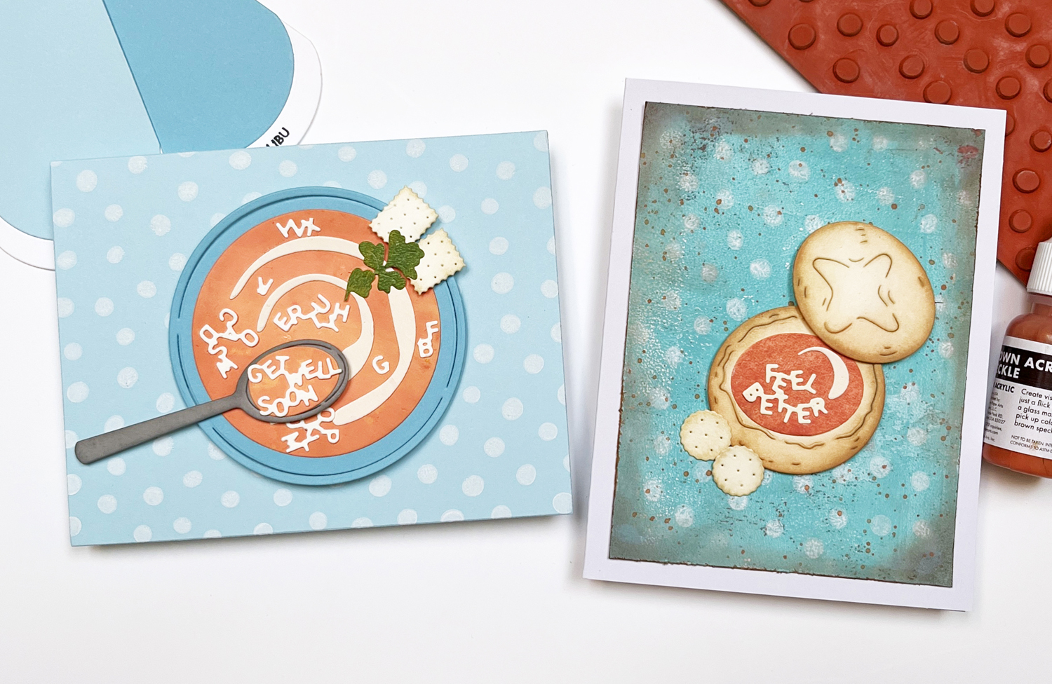 Two die cut get well cards featuring bowls of alphabet soup and glimmer foil backgrounds.