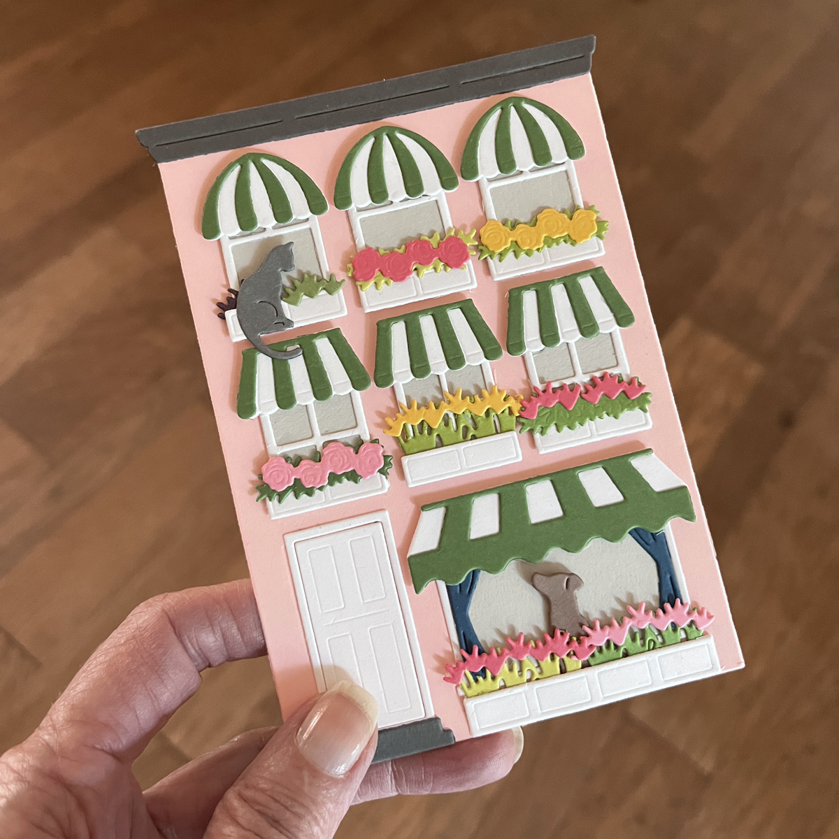 Charming die cut house apartment building card.