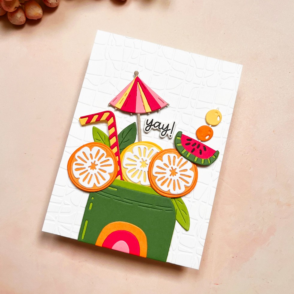 Summery die cut card with festive fruit, can, citrus slices