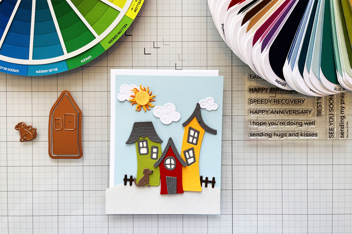 process photo of die-cut card using color theory with color wheel, color swatches and die cut compents ready to  assemble.