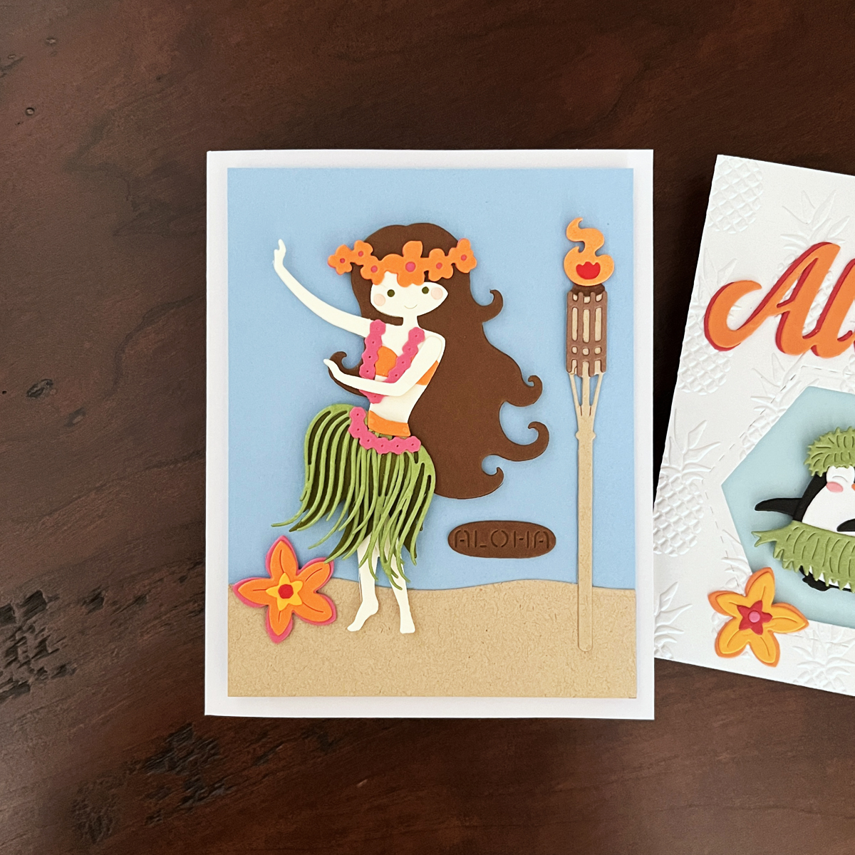 Tropical hula dancer die cut scene card crreated with Spellbinders June 2026 All-Clubs Crate kit.
