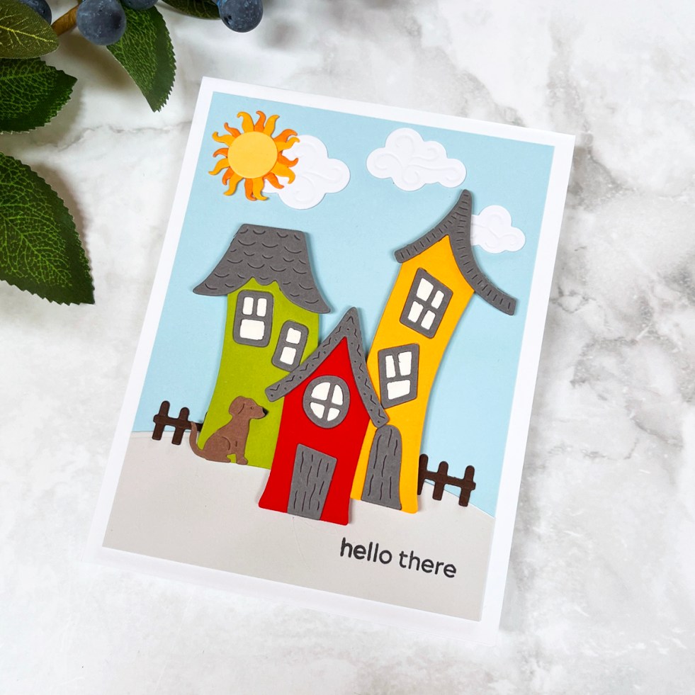 colorful die cut trio of houses card