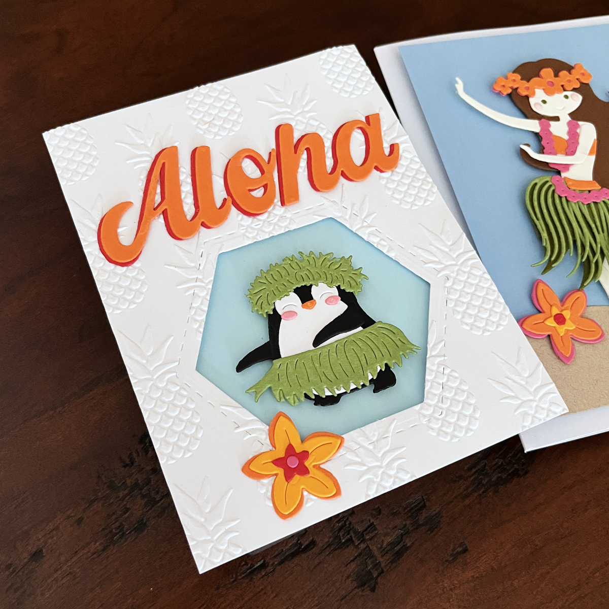 Adorable tropical theme hexagon window card with a hula dancing penguin + a die cut Aloha sentiment