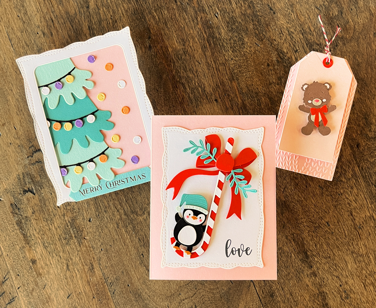 3 festive Christmas cards + tag that were die cut.