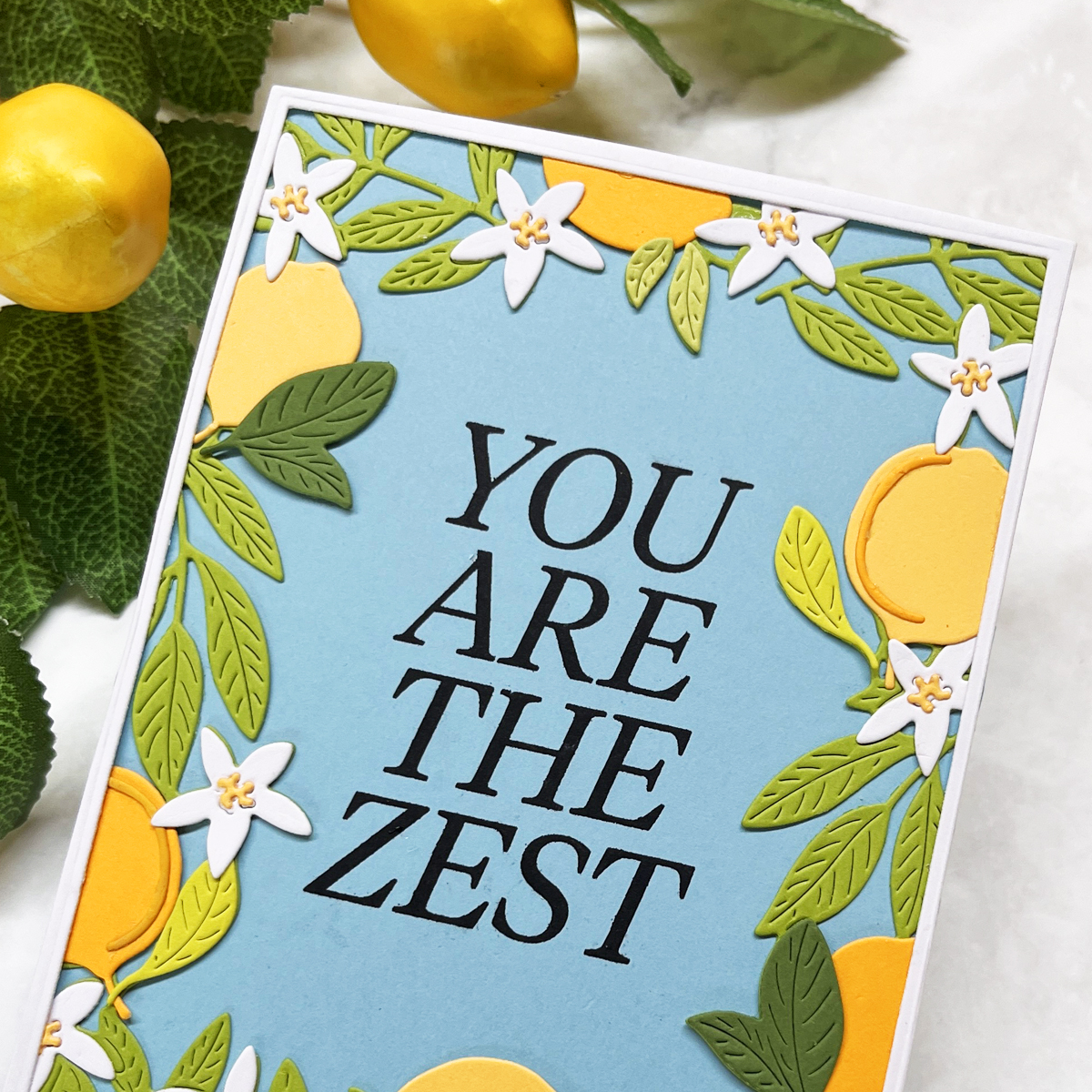 Stamped and die cut lemon wreath frame card with "You are the Zest" sentiment.