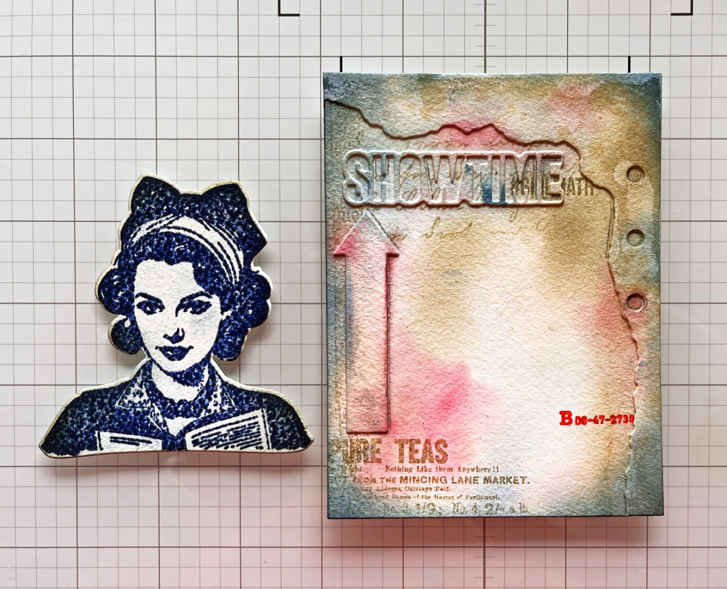 process photo of completed mixed media background with focal point on my craft mat.