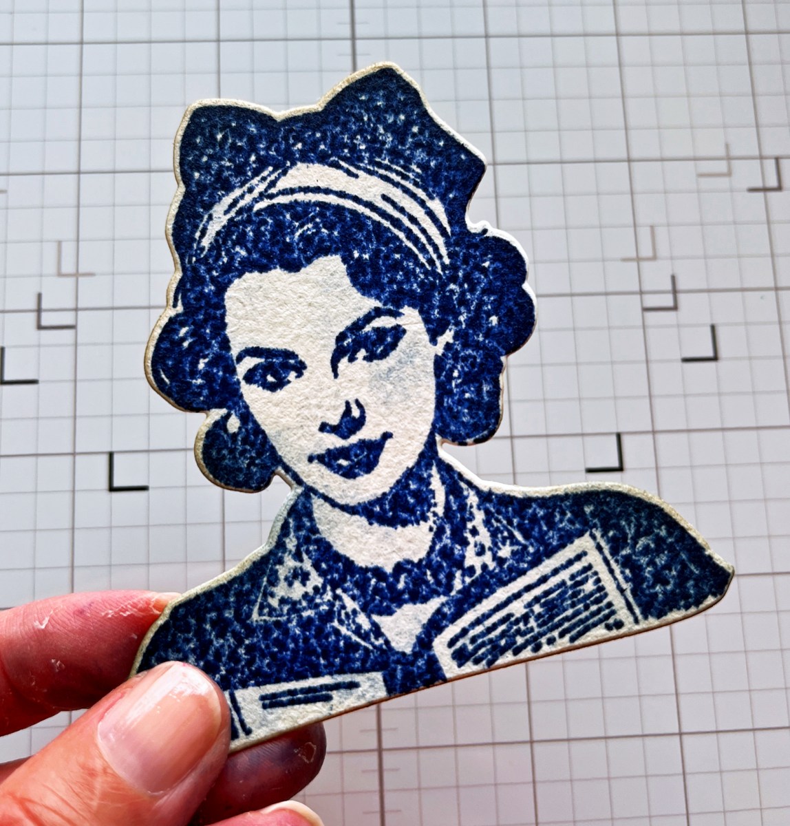 process photo of my stamped and die cut mixed media focal point on my craft mat