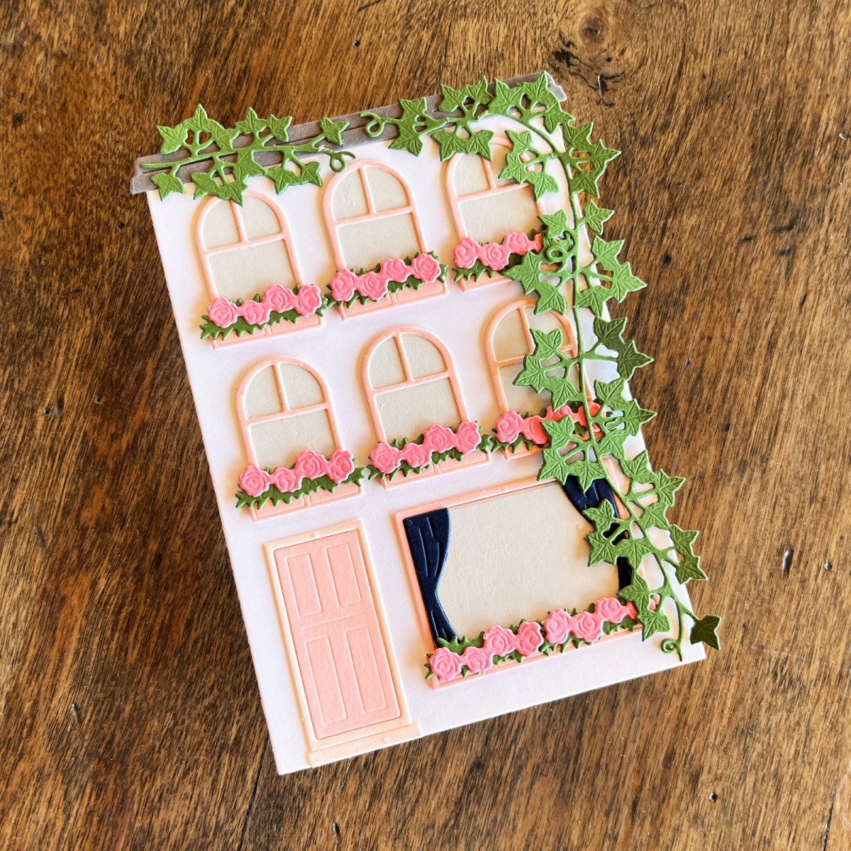 Die-cut card using the Spellbinders house die from the City Holiday Collection